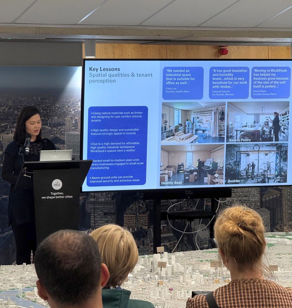 Regina Kertapati presenting the Evaluation Report
