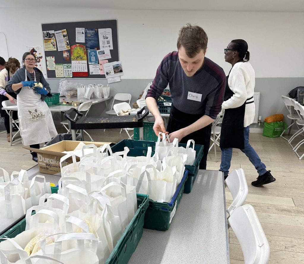 Packing up leftover food for distribution